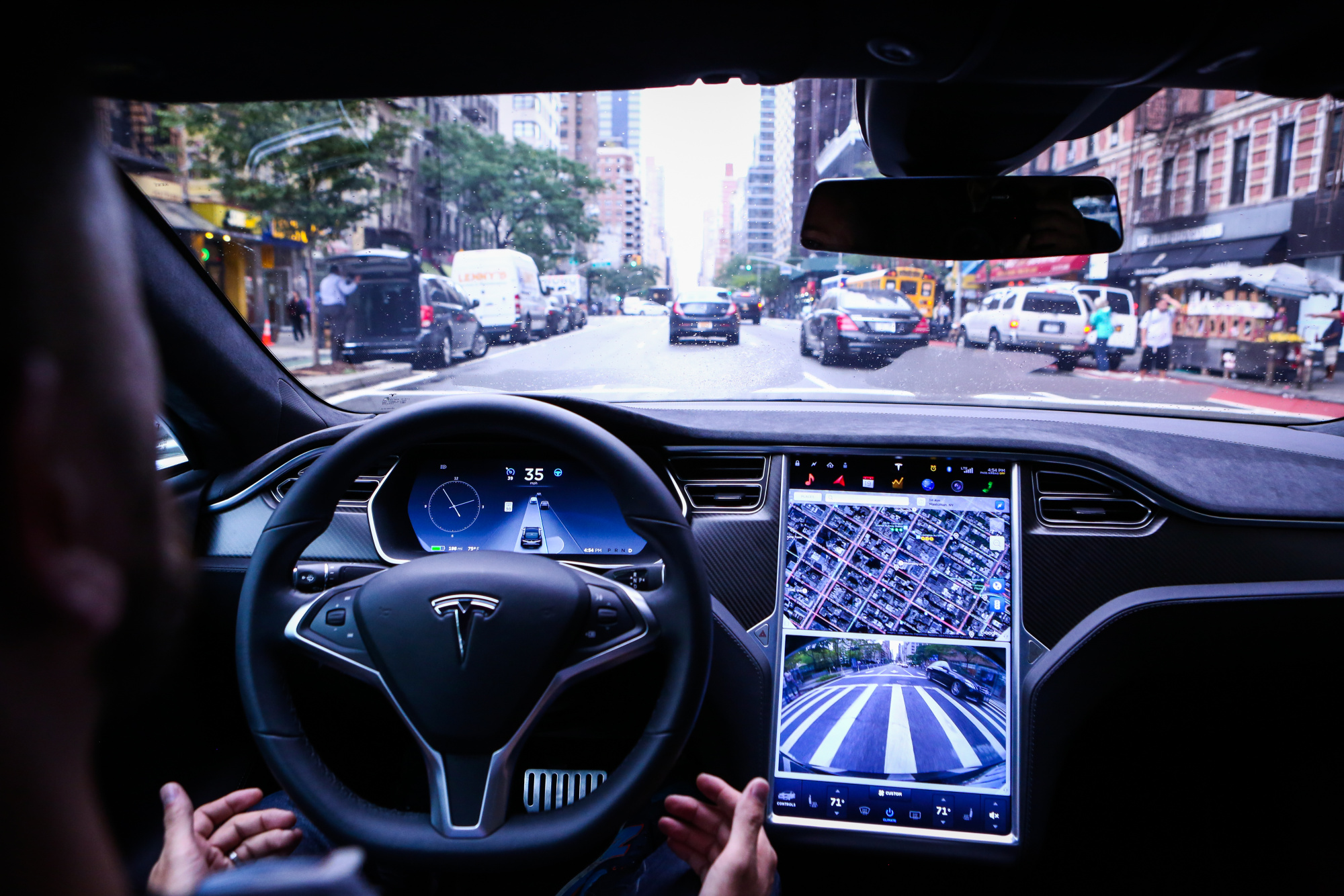 Elon Musk's Challenge to Car Makers: Why No One's Driving with Tesla's Self-Driving Tech Yet