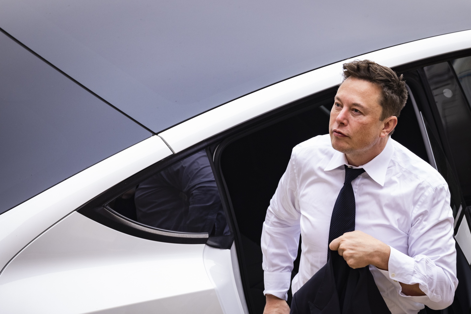 Elon Musk's Tightrope Walk How Tesla's Future Hangs in Balance Amid CEO's Controversies and Bold Moves--