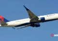 Breaking News Delta's Old Plane Risks Safety with Emergency Slide Falling Off Mid-Air