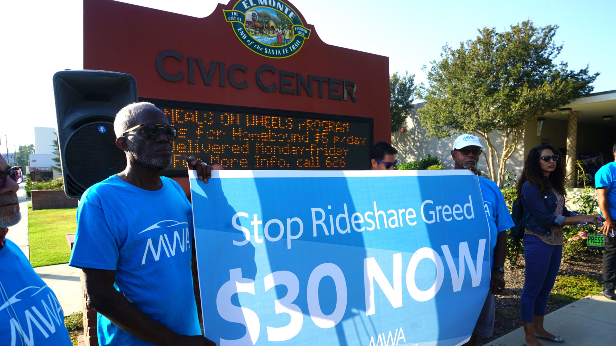 California Workers Rally for $30 Minimum Wage as Costs Soar